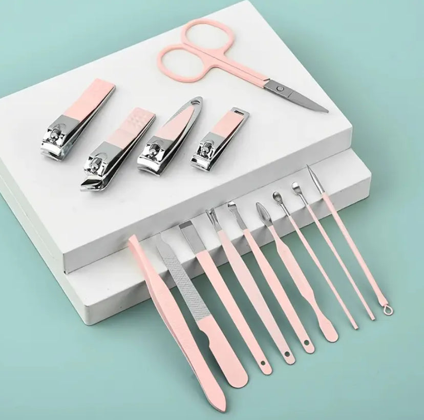 Set manicura 14 en 1. Color rosado. Acero inoxidable. Cuidado personal