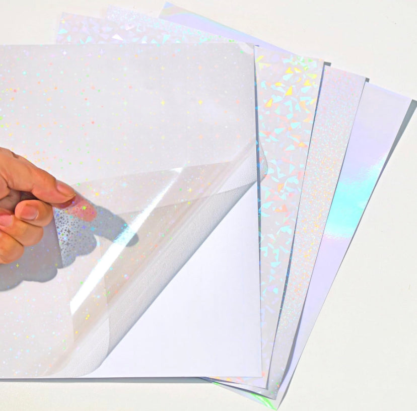 Set de 12 hojas de papel holográfico. Papelería